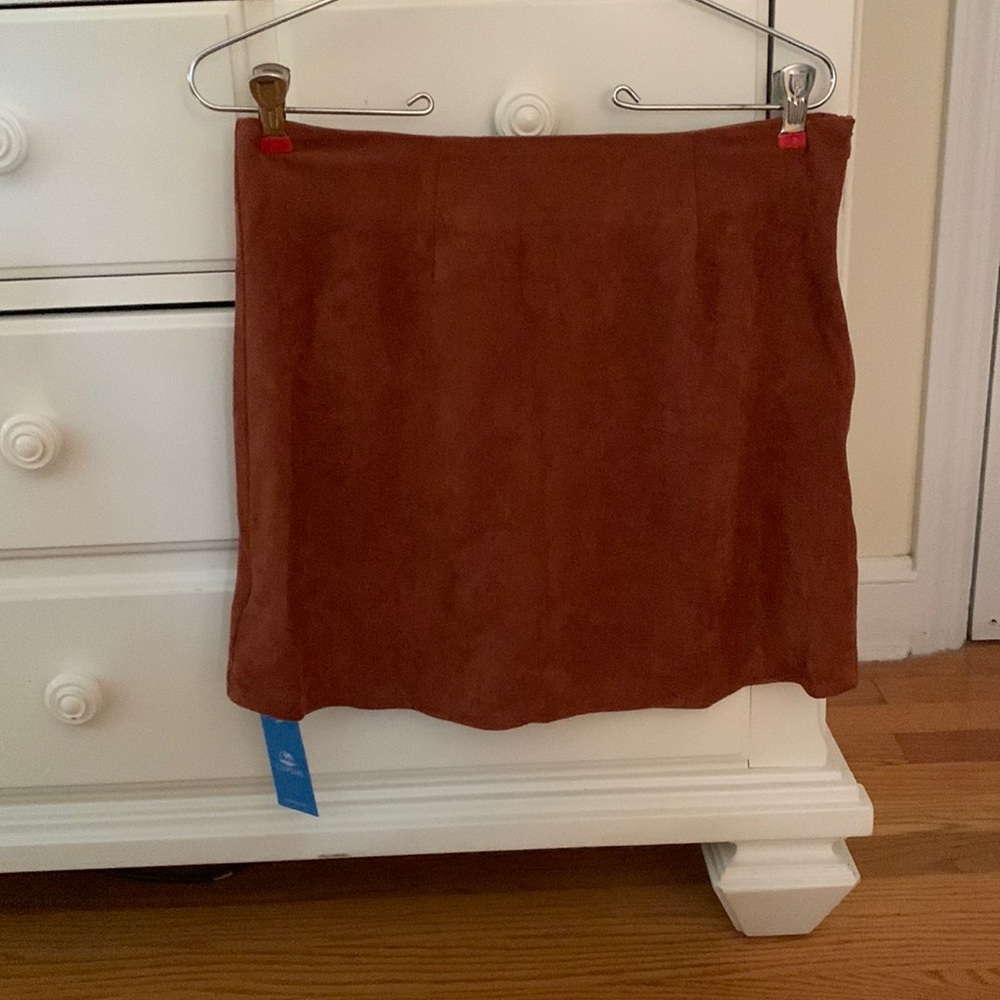 Rust faux suede mini skirt  size small . Tags on